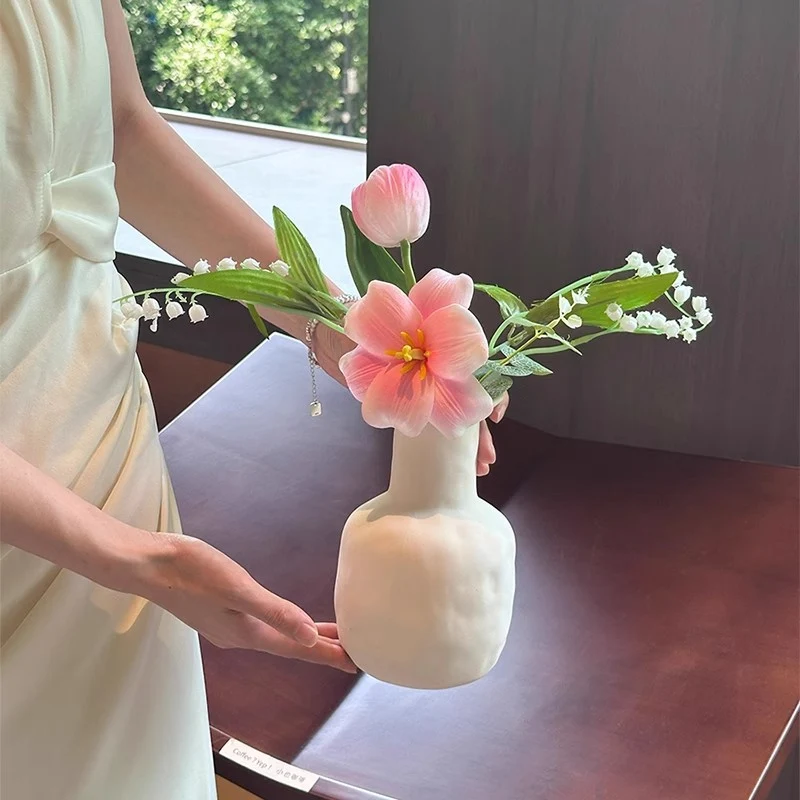 Dekorative künstliche Blumenarrangement