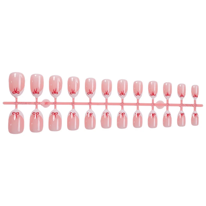 Kreatives Press-On Nagelkunstset mit Schleifen Design