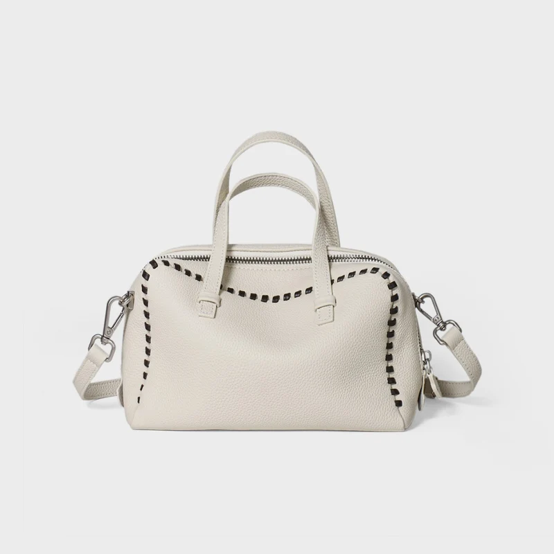 Gepunktetes Leder Top-Handle Crossbody Satchel mit Whipstitch-Besatz