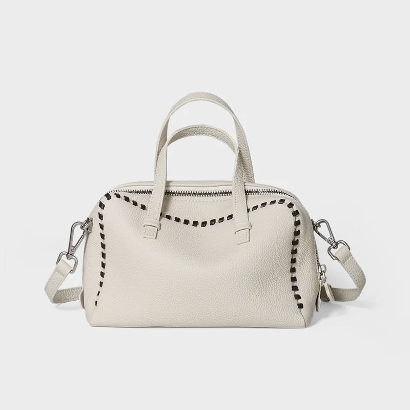 Gepunktetes Leder Arztstil-Satteltasche mit Whipstitch-Trimm und abnehmbarem Crossbody-Gurt