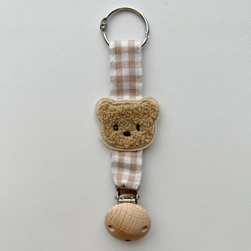 Baumwolle Gingham Strap Schnullerclip mit gepolstertem Blumenschlafsack und Holz-Sicherheitsklammer