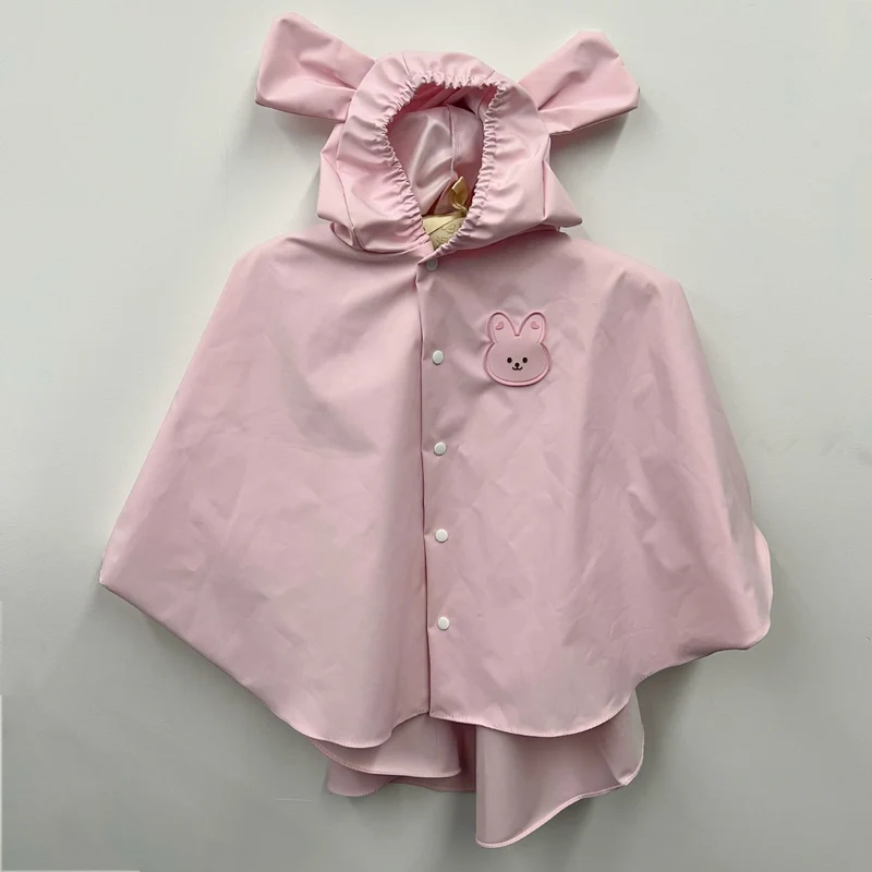 Kinder wasserdichter Kapuzenregenponcho mit Bunny-Ohren-Kapuze und Druckknopfverschluss vorne