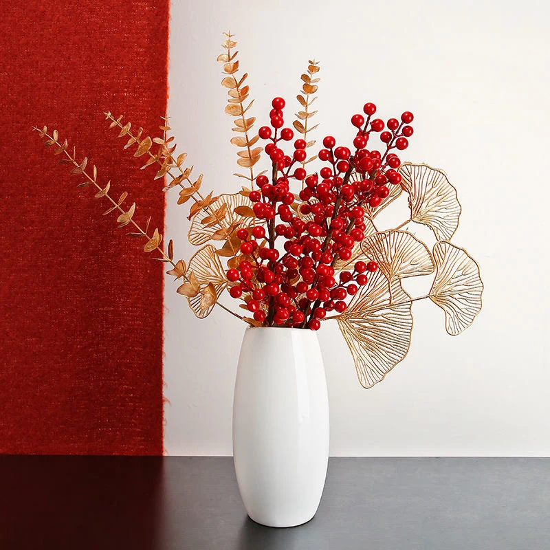 Dekoratives Goldenes Münz-Zweig Arrangement