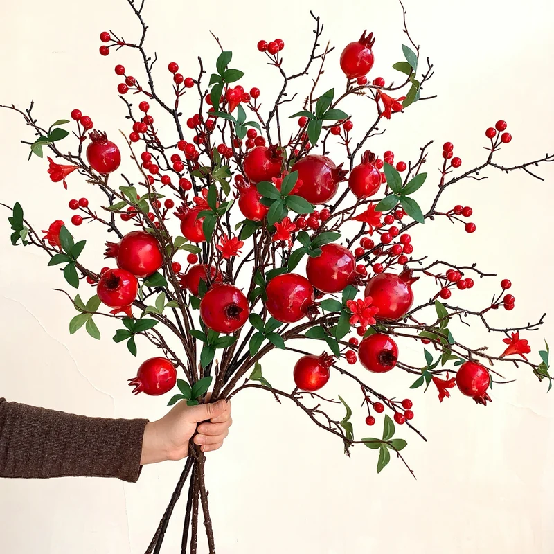 Dekorative Granatapfelblütenarrangement
