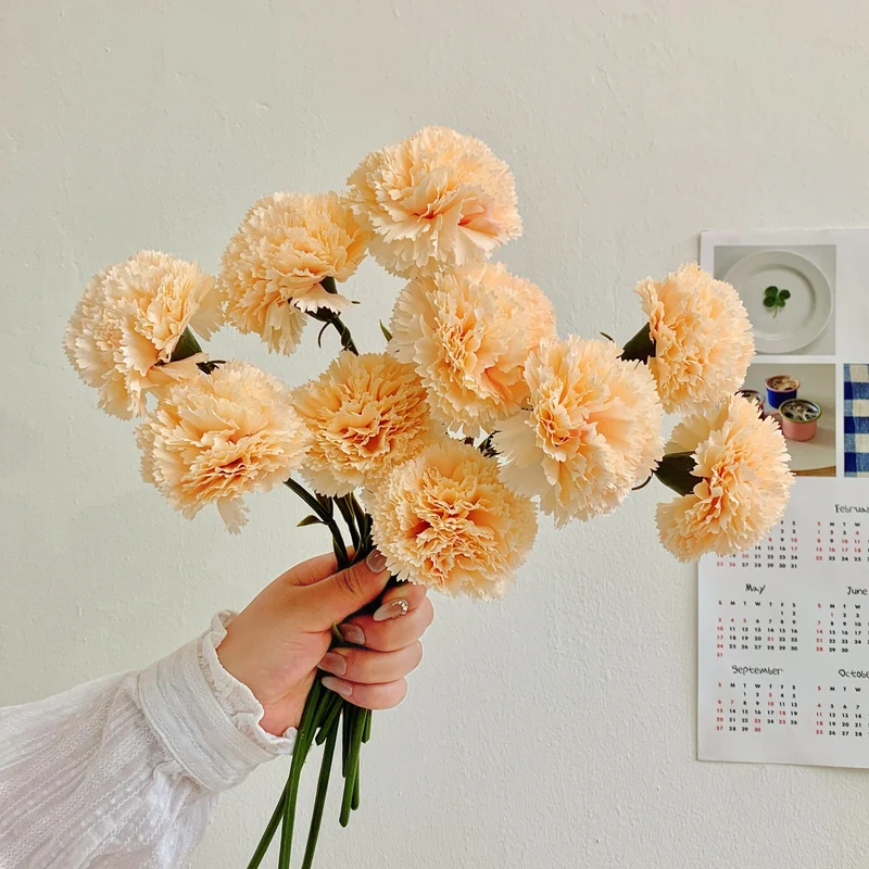 Dekoratives Blumenmittelstück für Tischdekoration
