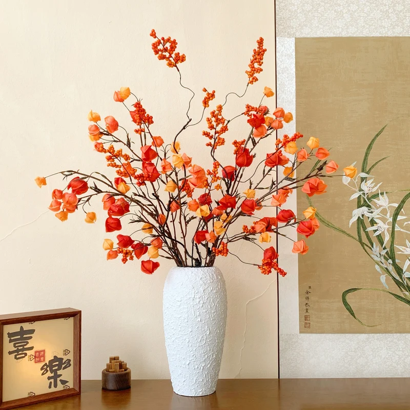Dekorative Blumenast für die Hauseinrichtung