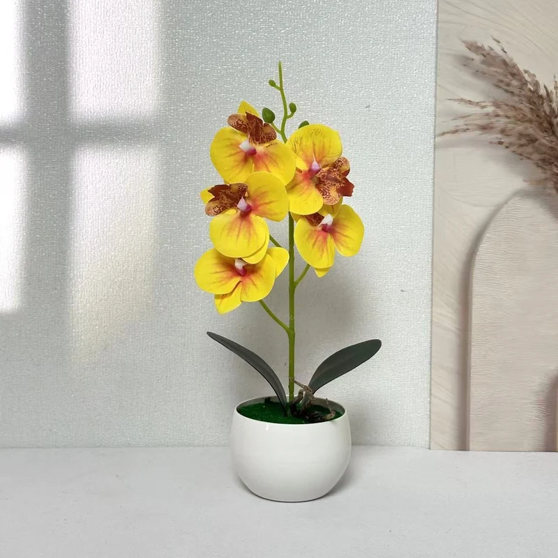 Realistische künstliche Orchideenpflanzenarrangement für die Innendekoration