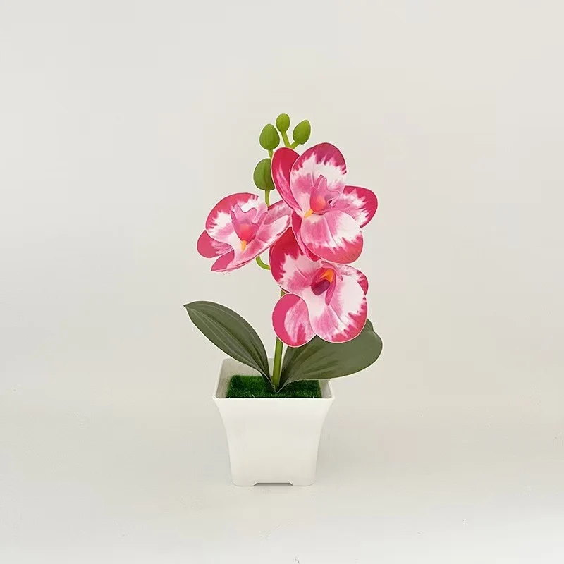 Realistische Künstliche Orchidee in dekorativem Pflanzenpot für Dekoration
