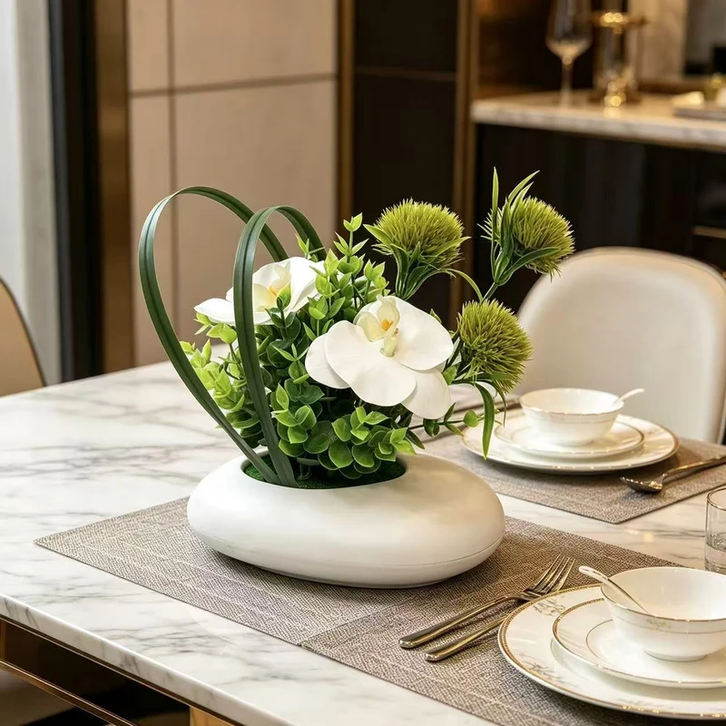 Moderne dekorative künstliche Blumenanordnung