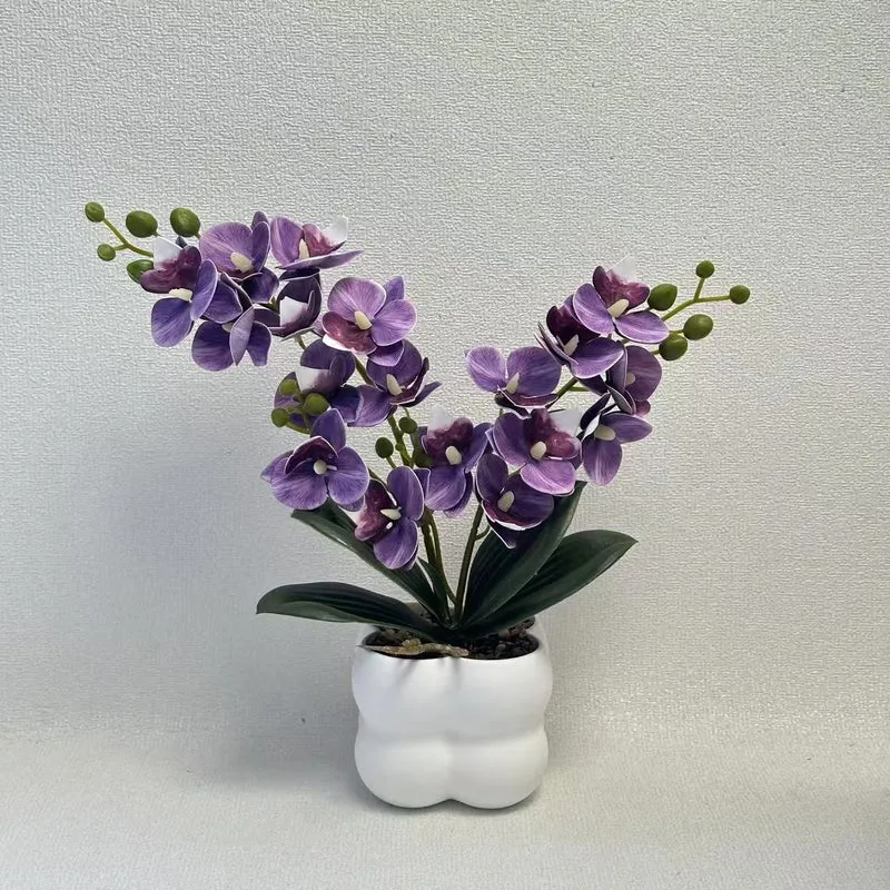 Lebensechte Orchideen Tischmittelstück