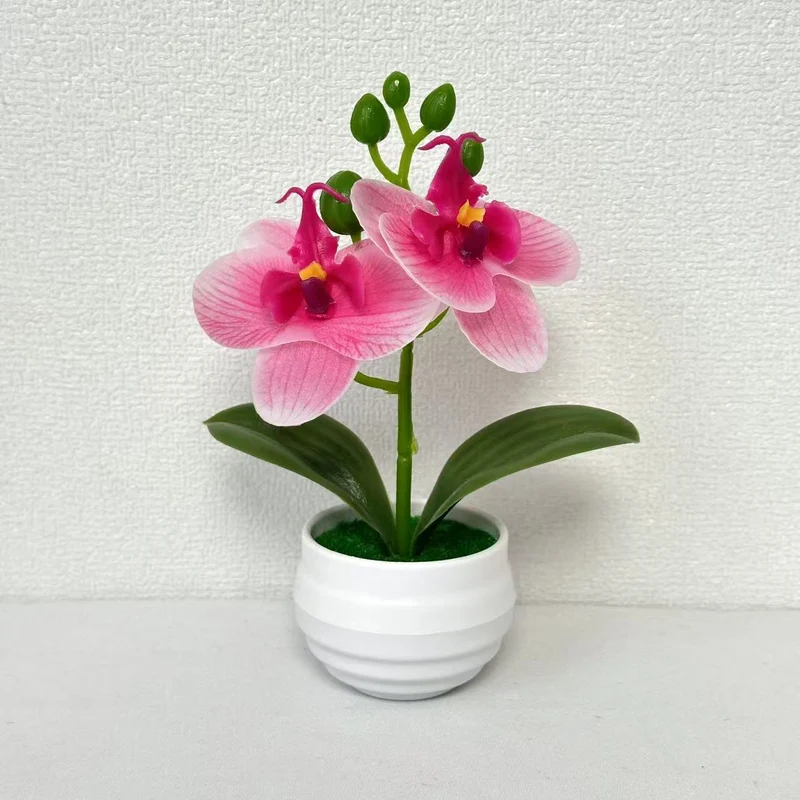 Lebensechte künstliche Orchideenpflanzenanordnung für die Innendekoration