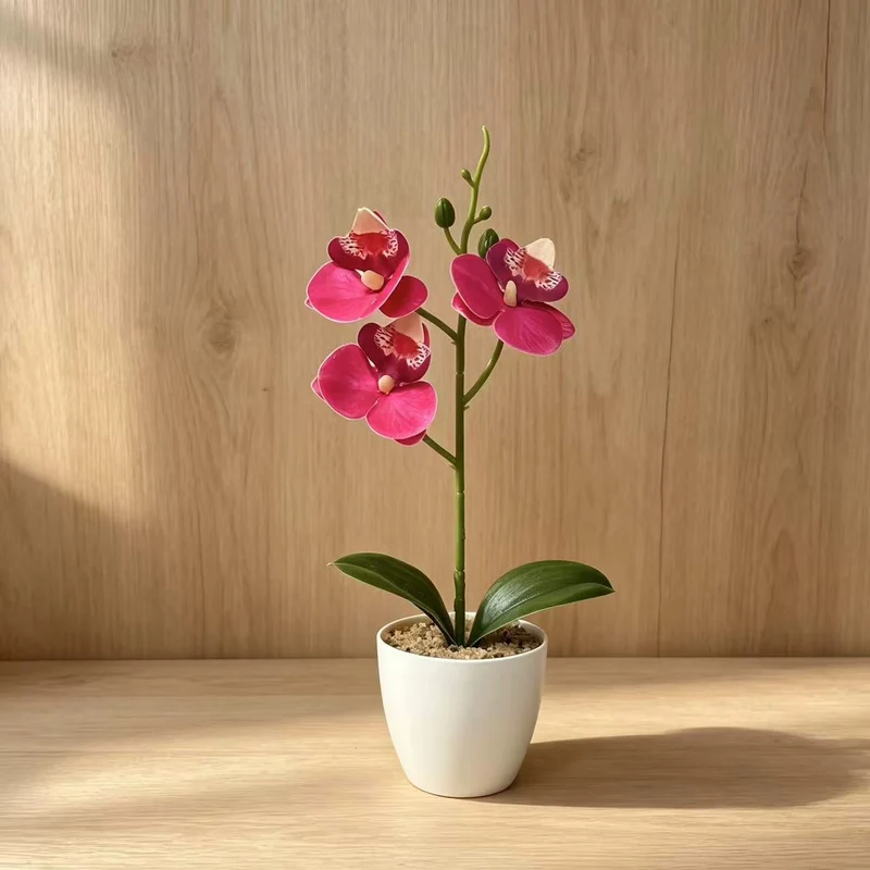 Elegante Kunst-Orchideen-Pflanzenschmuck