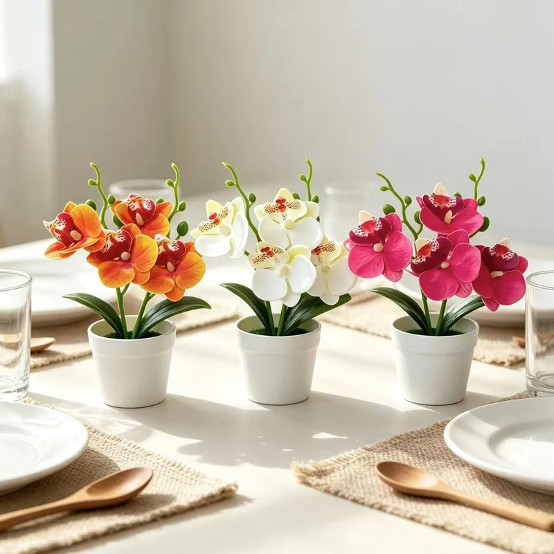 Elegante dekorative Orchideen-Blumenarrangement für die Wohnungseinrichtung