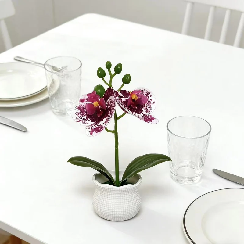 Elegante künstliche Orchideenpflanzenanordnung für die Wohnkultur-Darstellung