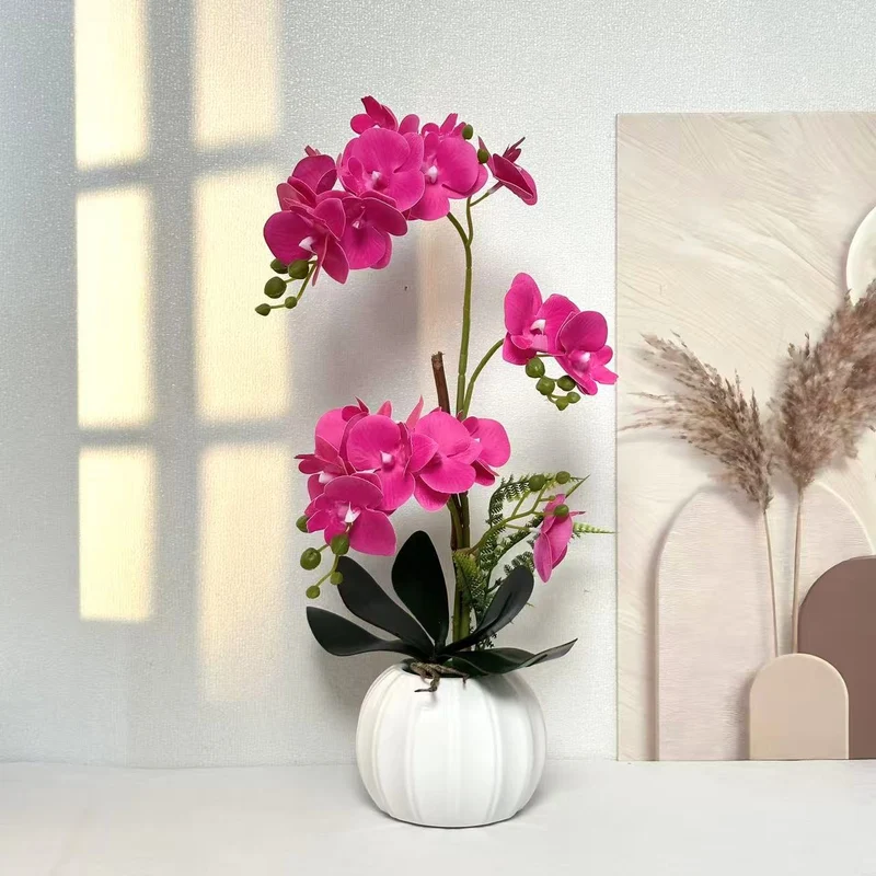 Elegante künstliche Orchideenarrangement für die Innenraumdekoration