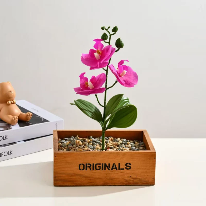 Elegante künstliche Orchideenarrangement für Tischdekoration
