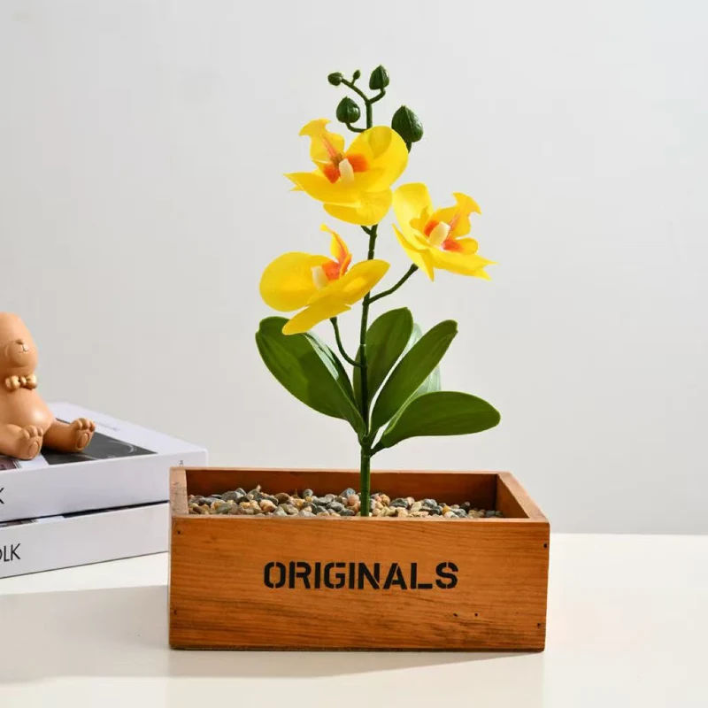 Elegante künstliche Orchideenarrangement für Tischdekoration