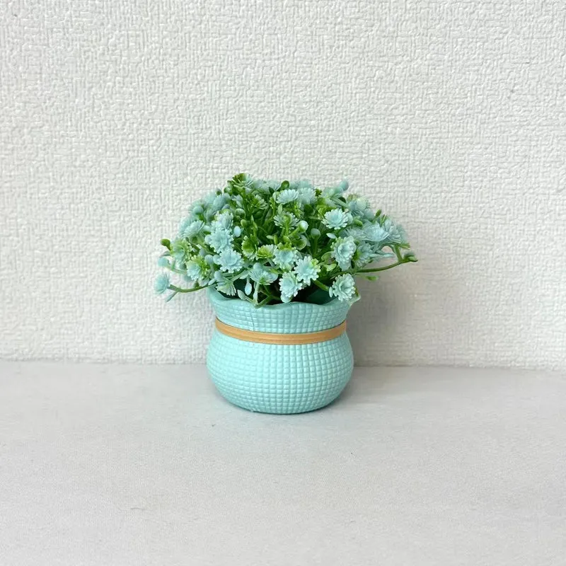 Dekorative Miniatur Kunstblumen Arrangement