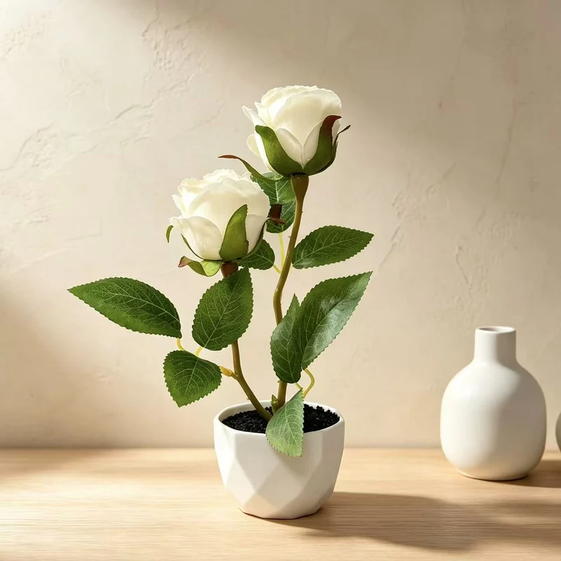 Dekoratives Künstliches Rosengewächs Arrangement für die Wohnkultur