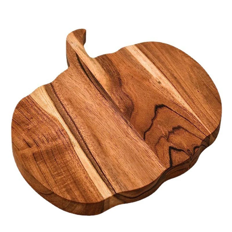 Holz-Schneidebrett in Kürbis-Silhouette aus Akazienholz mit ergonomischem Griff