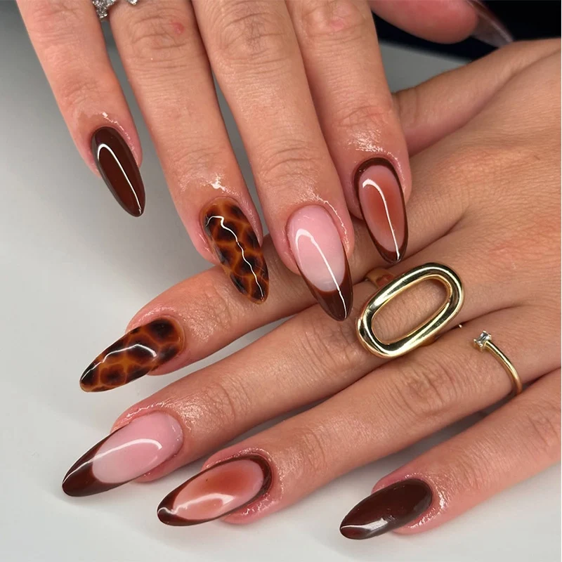 Stiletto-förmige Press-On Nagelkunst Set mit Schildpatt und französischen Spitzen