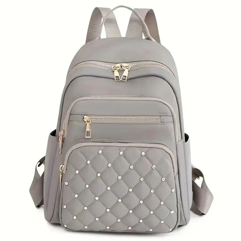 Damen gesteppter Rucksack mit dekorativen Nieten Karnz