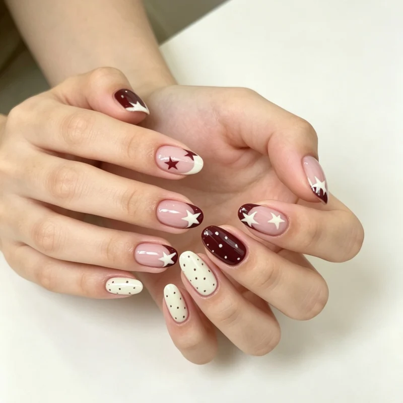 Künstlerisch mit Sternen verzierte Nagelkunstverlängerungen