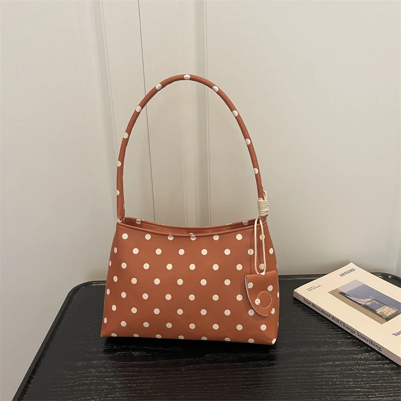 Lässige gepunktete Schulterhandtasche