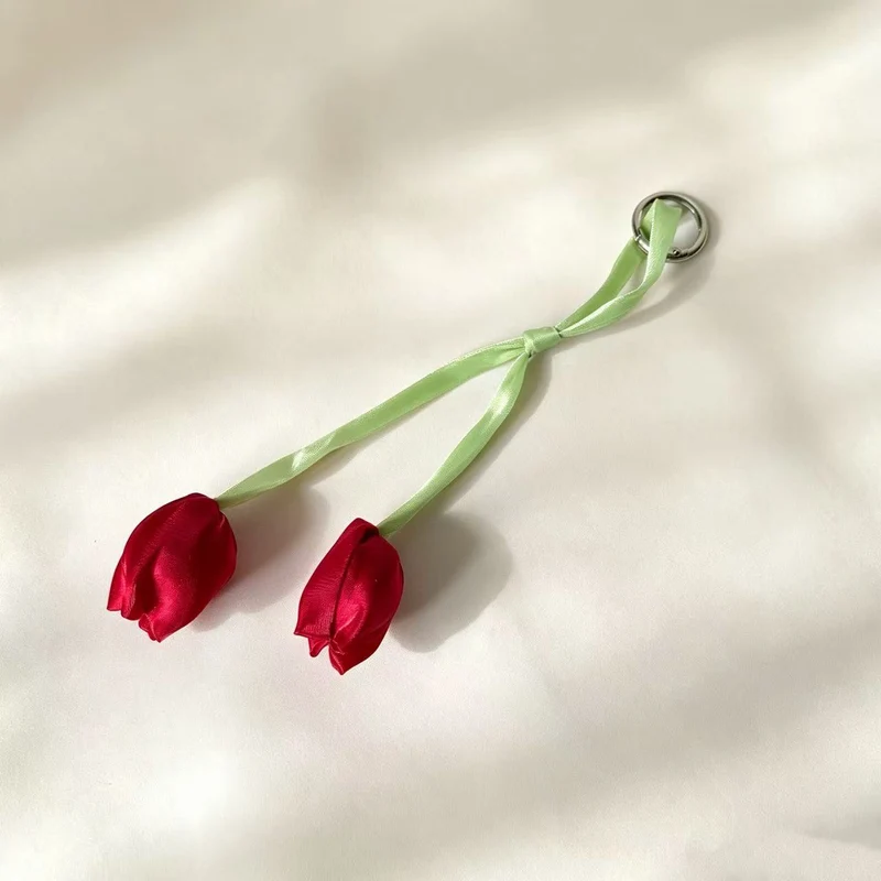 Dekorativer floraler Schlüsselanhänger Karnz