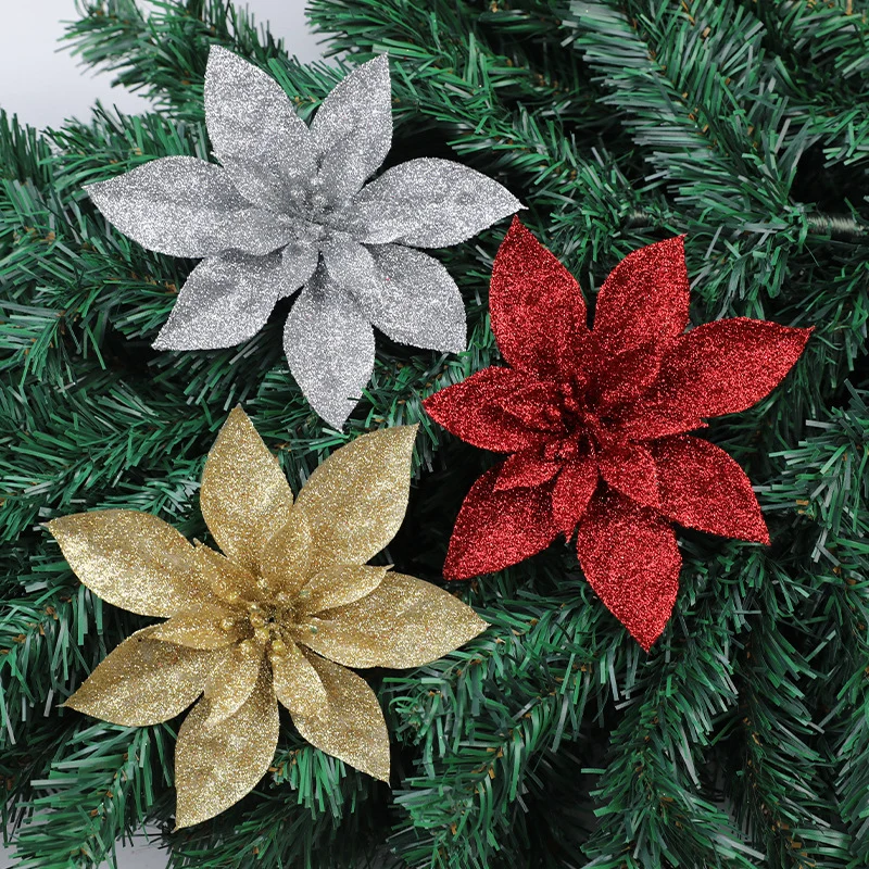 Glitzernde Weihnachtssternblumenornamente Karnz