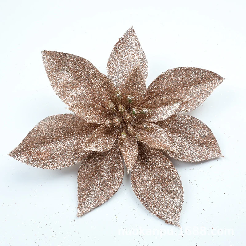 Glitzernde Weihnachtssternblumenornamente Karnz