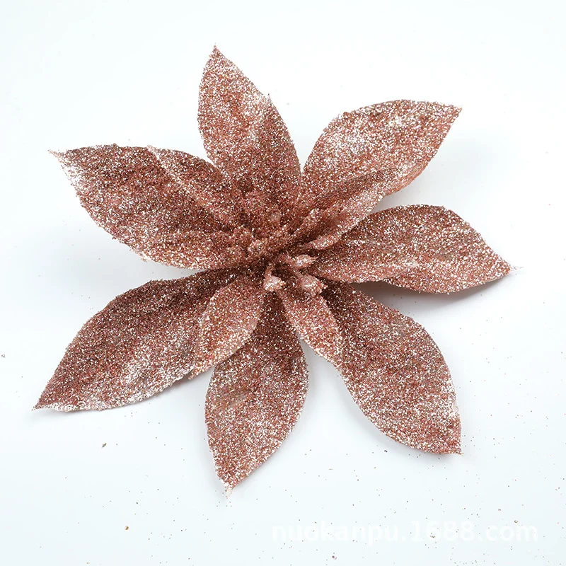 Glitzernde Weihnachtssternblumenornamente Karnz