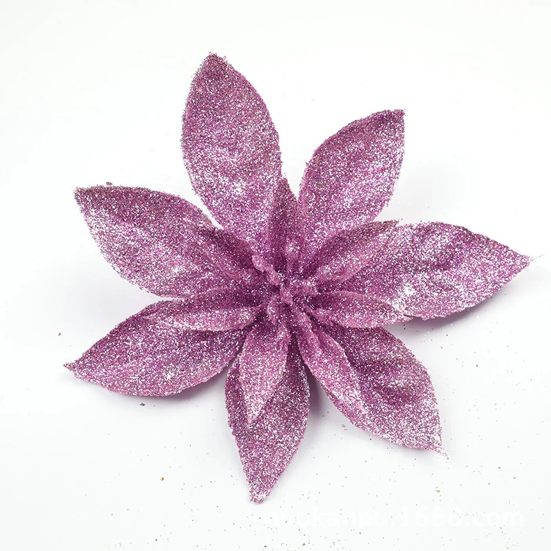 Glitzernde Weihnachtssternblumenornamente Karnz