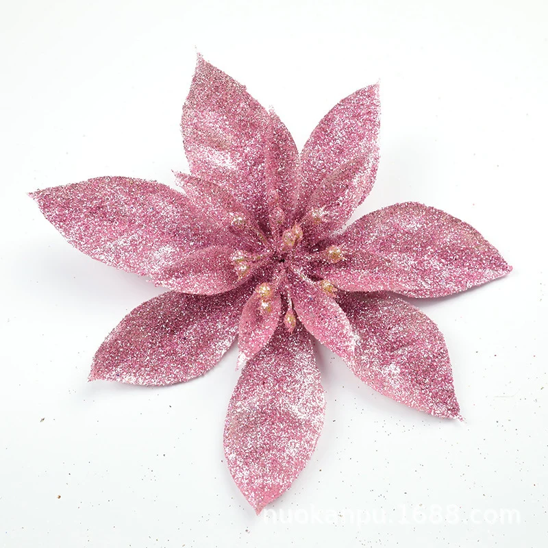 Glitzernde Weihnachtssternblumenornamente Karnz