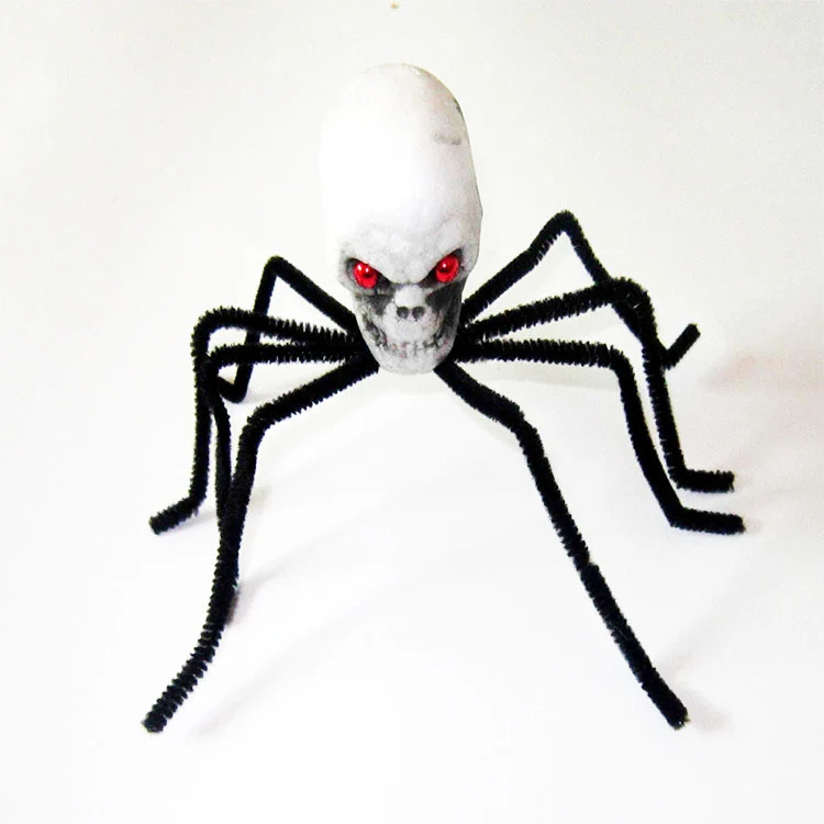Dekorative Schädel-Spinnenfigur Karnz
