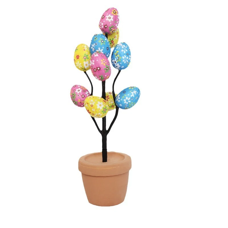 Dekorativer Blumentopf mit bunten Eierblüten Karnz