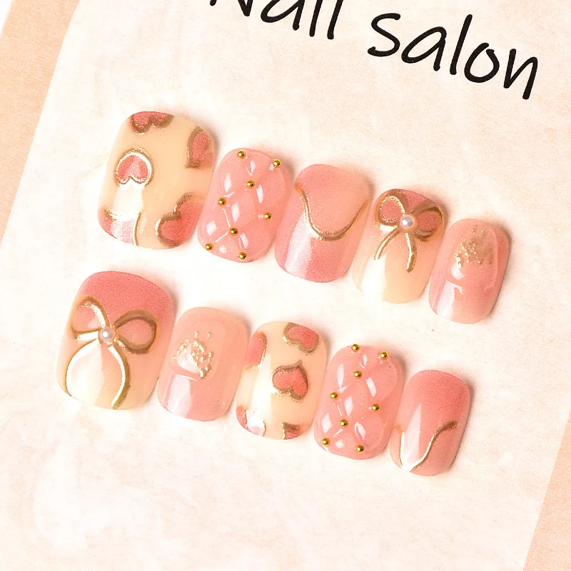 Elegantes Herz- und Band-Thema Press-On Nagelset Karnz
