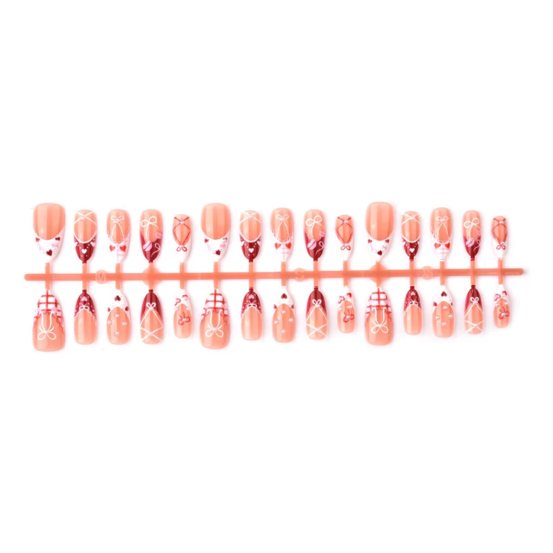 Dekoratives Presse-On Nagelkunstset mit Schleifen- und Herzen-Designs Karnz
