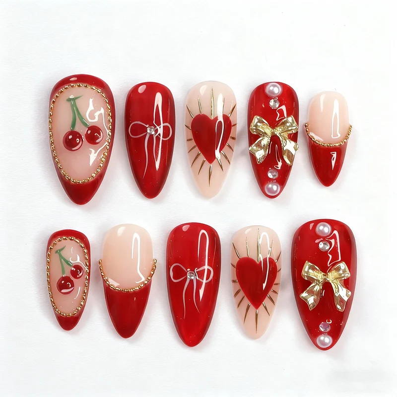 Dekorative Herz- und Kirsch-Press-On-Nagelkunst Karnz