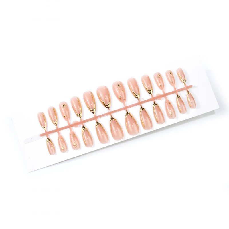 Chic Stiletto Press-On Nagelkunstset mit goldenen Sternakzenten Karnz