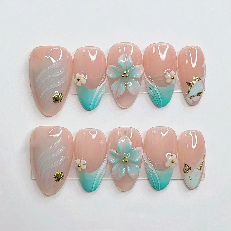 Künstlerisches Muscheln-inspiriertes Nagelset Karnz