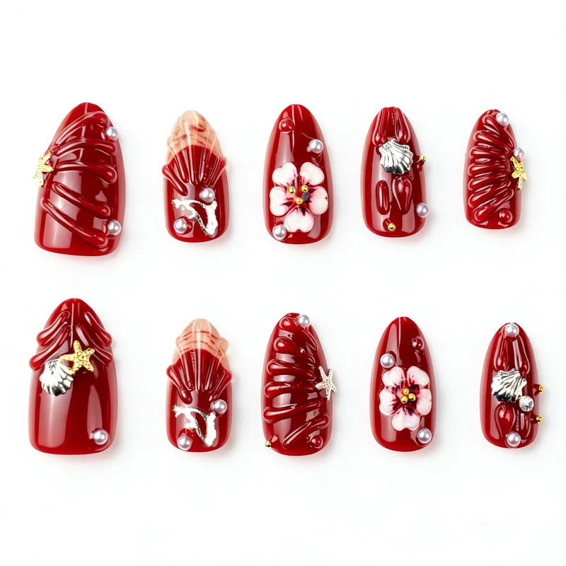 Künstlerisches Press-On Nagelkunst Set mit floralen und Muschel-Designs Karnz