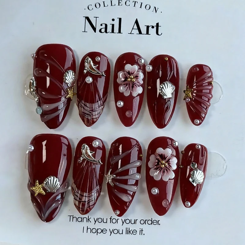 Künstlerisches Press-On Nagelkunst Set mit floralen und Muschel-Designs Karnz