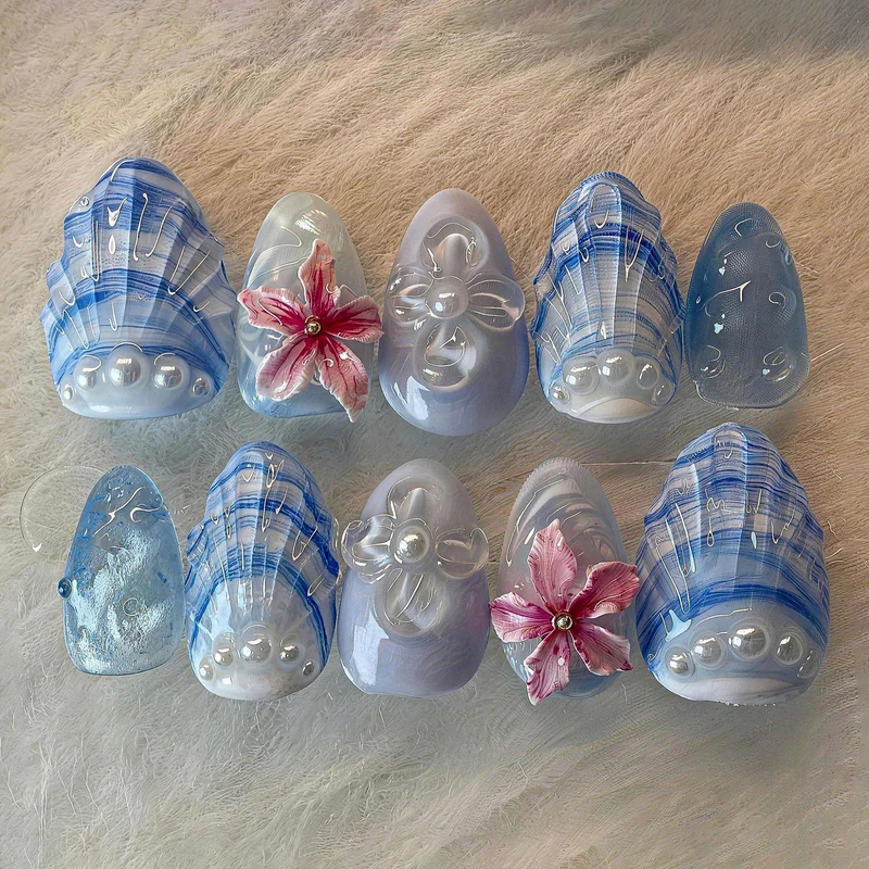 Künstlerisches floral und Muschel-Design Press-On Nagelkunst Set Karnz