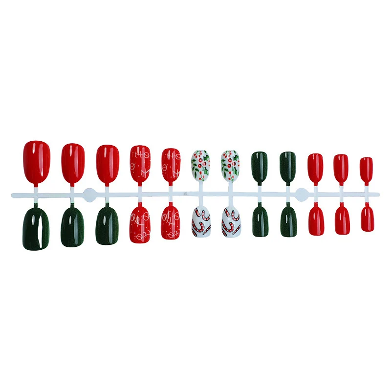 Weihnachts Kunstnagelset mit festlichen Motiven und Glitzerakzenten Karnz