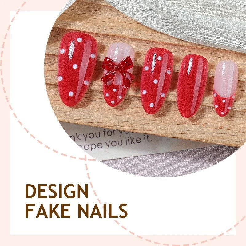 Kunstnagelset mit verspieltem Schleifen-Design und polka Punkte Karnz