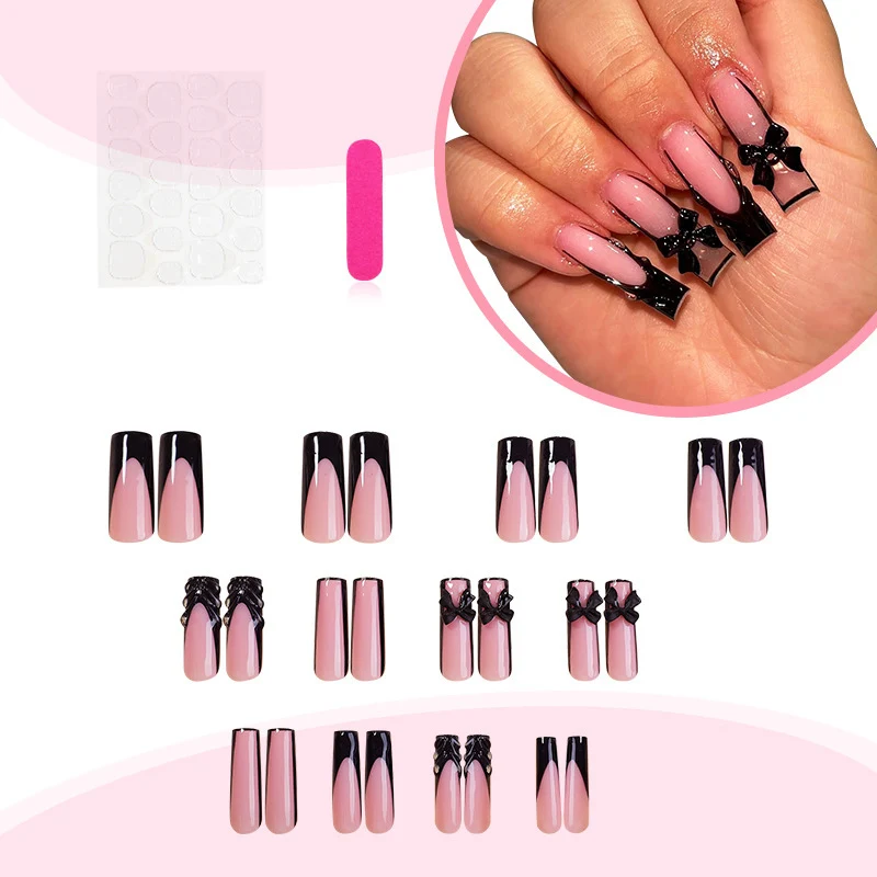Kunstnagelset mit stilvollen schwarzen und rosa Designs Karnz