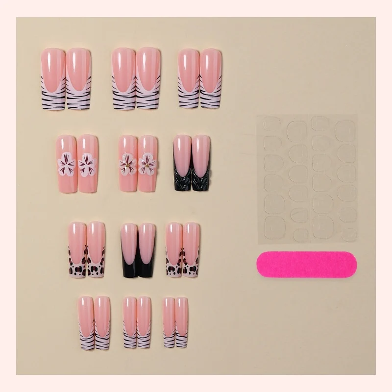 Kunstnagelset mit floralen und marmorierten Designs Karnz