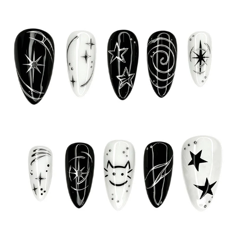 Kunstnagelset mit kreativen star-motiven und glitzernden Akzenten Karnz