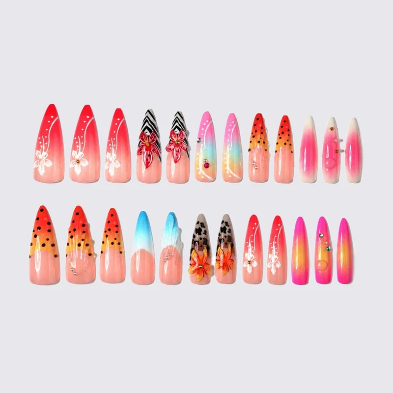 Kunstnagelset mit kreativen floralem Design und Glitzerelementen Karnz